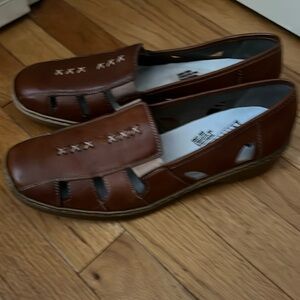 Rieker brown anti stress leather slipons. Size 11 in never worn condition.